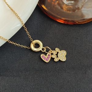 Collier En Acier Titane Et Cuivre Plaqué Or Avec Pendentifs Cœur Et Patte En Zircon Bijou Raffiné Pour Femme