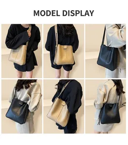 Détails du sac seau en cuir pour femme avec coutures verticales et bandoulière longue