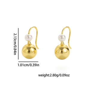 Detail view of gold drop pearl earrings showing precise height and width measurements