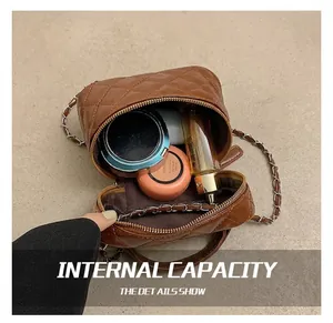 Top view of brown quilted bucket bag interior showing makeup storage capacity