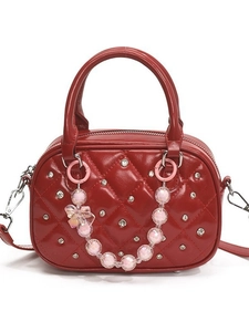 Red quilted boston bag with sparkling rhinestones and pink bow charm handle bag