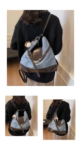 Détail d'un sac à dos patchwork en denim bleu et cuir marron avec breloque baseball