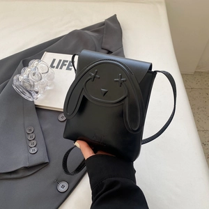 Fashionable black faux leather crossbody bag featuring a minimalist cartoon rabbit design