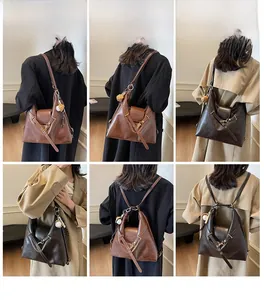 Détail du sac cabas polyvalent montrant les bretelles réglables pour sac à dos ou épaule