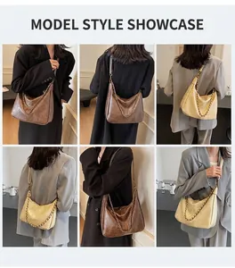 Asian model wearing minimalist hobo bag in deep brown and beige colors with chain detail