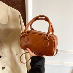 Sac Boston En Cuir PU Rétro Sac À Main Femme Avec Bandoulière Réglable Sac Bowling Élégant