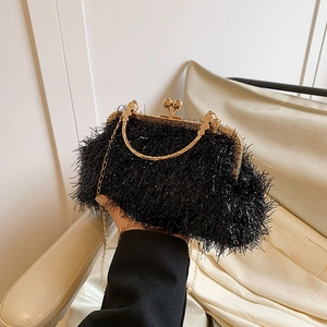 Elegant black evening clutch with shimmery fringe tassels and gold-tone metal handle