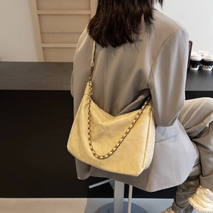 Minimalist beige PU leather hobo tote bag with gold chain strap for women commuters
