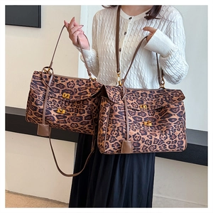 Leopard print tote bag set featuring large and small crossbody sizes with gold locks