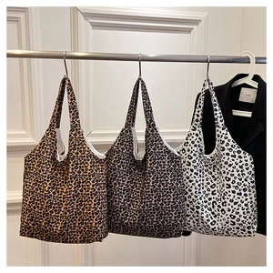 Detailed comparison of three stylish leopard print canvas tote bags in different colors