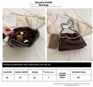Detailed size chart and interior capacity view of dark brown textured chain handbag