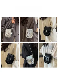 Chic metallic silver and black textured mini crossbody phone bags shown on models