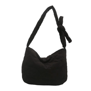 Black quilted puffer tote bag with large capacity and stylish knotted shoulder strap