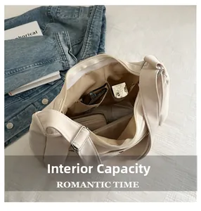 Top view of large capacity nylon crossbody bag with interior pockets for daily essentials