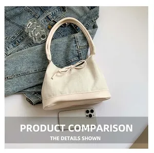 Detailed size comparison of herringbone tote bag with bow detail and leather base