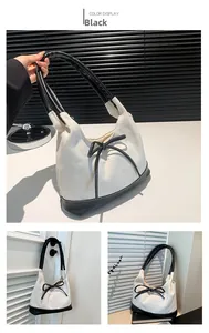 Three-view detail of a canvas tote bag with black leather trim and bow knot detailing