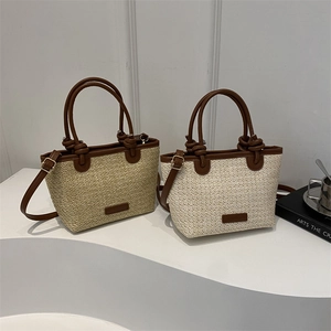 Fashionable straw tote bags with leather handles and adjustable straps in beige and khaki