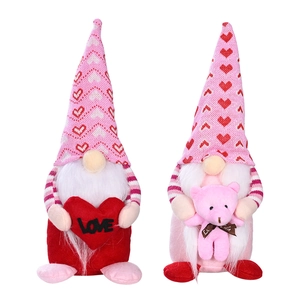 Pair of Valentine's Day pink heart gnomes with Love heart and small bear plush toy