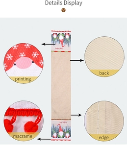 Makrodetail des Weihnachts-Tischläufers mit Wichtelmotiv, roten Quasten und hochwertigem Druck