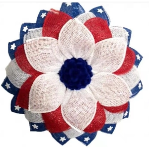 Close-up of patriotic US Independence Day wreath with red white and blue burlap mesh petals