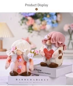 Close-up of Mother's Day faceless gnome plush dolls with 'I Love You' heart and flowers