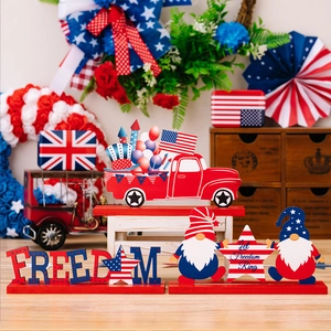 Detail of wooden 4th of July table decor set with Freedom lettering and patriotic gnomes