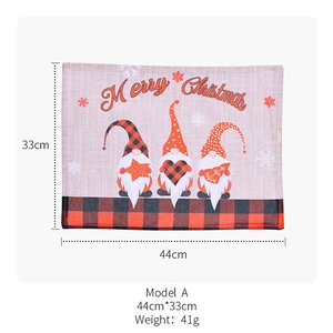 Detailed view of the Christmas gnome placemat showing 44x33cm dimensions and festive print