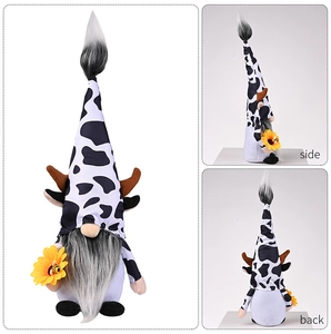 Cow themed gnome plush with sunflower and bee detail showing side and back views
