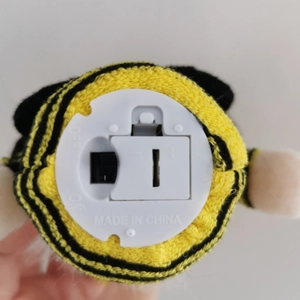 Detail of the battery compartment and ON/OFF power switch for the lighted bee gnome