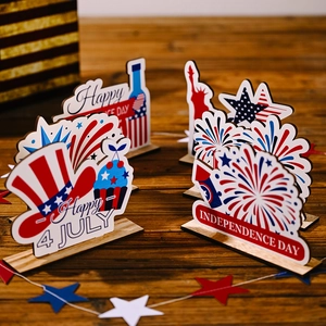 Independence Day wooden table decorations with stars, stripes, and 4th of July motifs