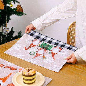 Christmas Gnome Placemat in linen blend featuring festive patterns and Merry text