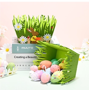 Detail of Easter felt grass baskets with bunny and daisy accents plus colorful decorative eggs