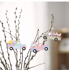 Detailed view of colorful wooden Easter truck pendants with beads hanging on branches