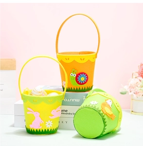 Detailed view of colorful Easter felt baskets with rabbit, snail, and chick patterns