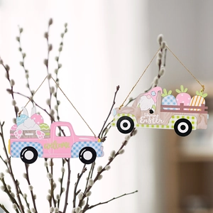 Easter wooden truck pendants with rabbit and eggs hanging on spring branches