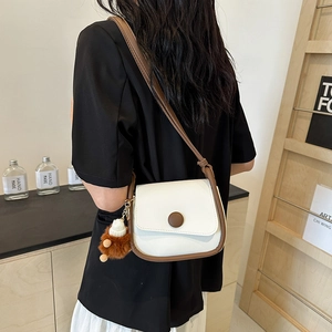 Vintage contrast small square bag in cream with brown trim and plush charm detail