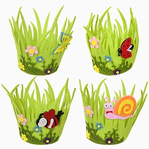 Set of four green felt Easter baskets with grass edge and colorful insect decorations
