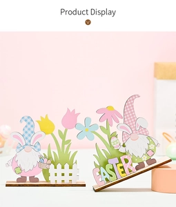 Detail of wooden Easter gnome ornaments with colorful flower and fence patterns