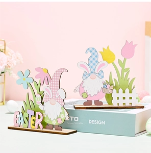 Detail of wooden Easter gnomes with multilayer laser cut design and floral fence