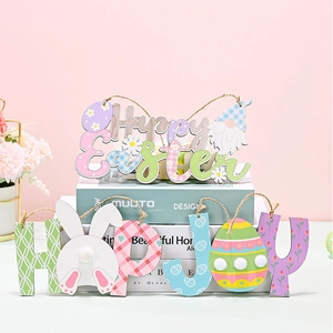 Detailed view of Happy Easter wooden gnomes and egg ornaments on a pastel background