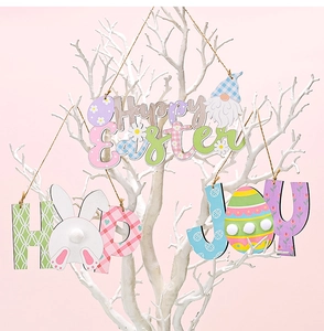 Easter wooden ornaments set with bunny and egg patterns hanging on white tree branches