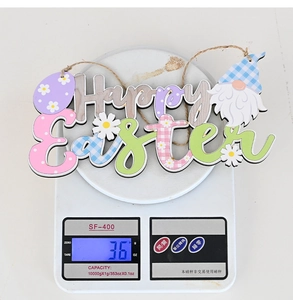 Detail of wooden Happy Easter hanging sign with gnome design on weighing scale