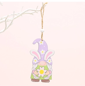 Detail of wooden Easter gnome ornament with bunny ears and floral hat on a pink background