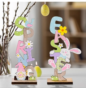 Close-up of Easter and Spring vertical wooden letter signs with colorful gnome and bunny