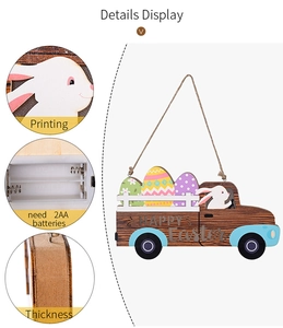Detail of wooden Easter truck sign showing print quality and 2AA battery compartment