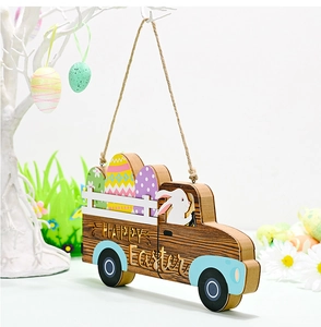 Detail of wooden Easter truck sign with Happy Easter text and colorful eggs