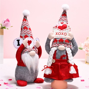 Detail of Valentine Gnomes with XOXO envelope and heart signs on pink background