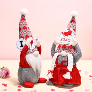 Pair of Valentine's Day faceless gnomes with XOXO card and red grey knitted outfits