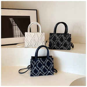 Group display of chic quilted denim mini tote bags in white, black, and navy blue