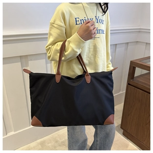 Large waterproof oxford nylon tote bag with brown leather trim and handles